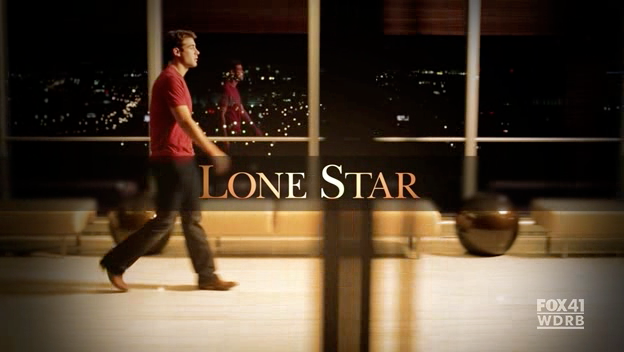 Promotional image for TV show "Lonestar." Lone man walks across the field of view. Windows behind him reveal a city at night. 