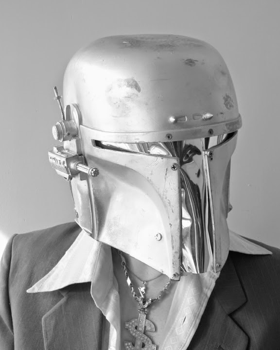 The Sucklord wearing Boba Fett's helmet from Star Wars. 