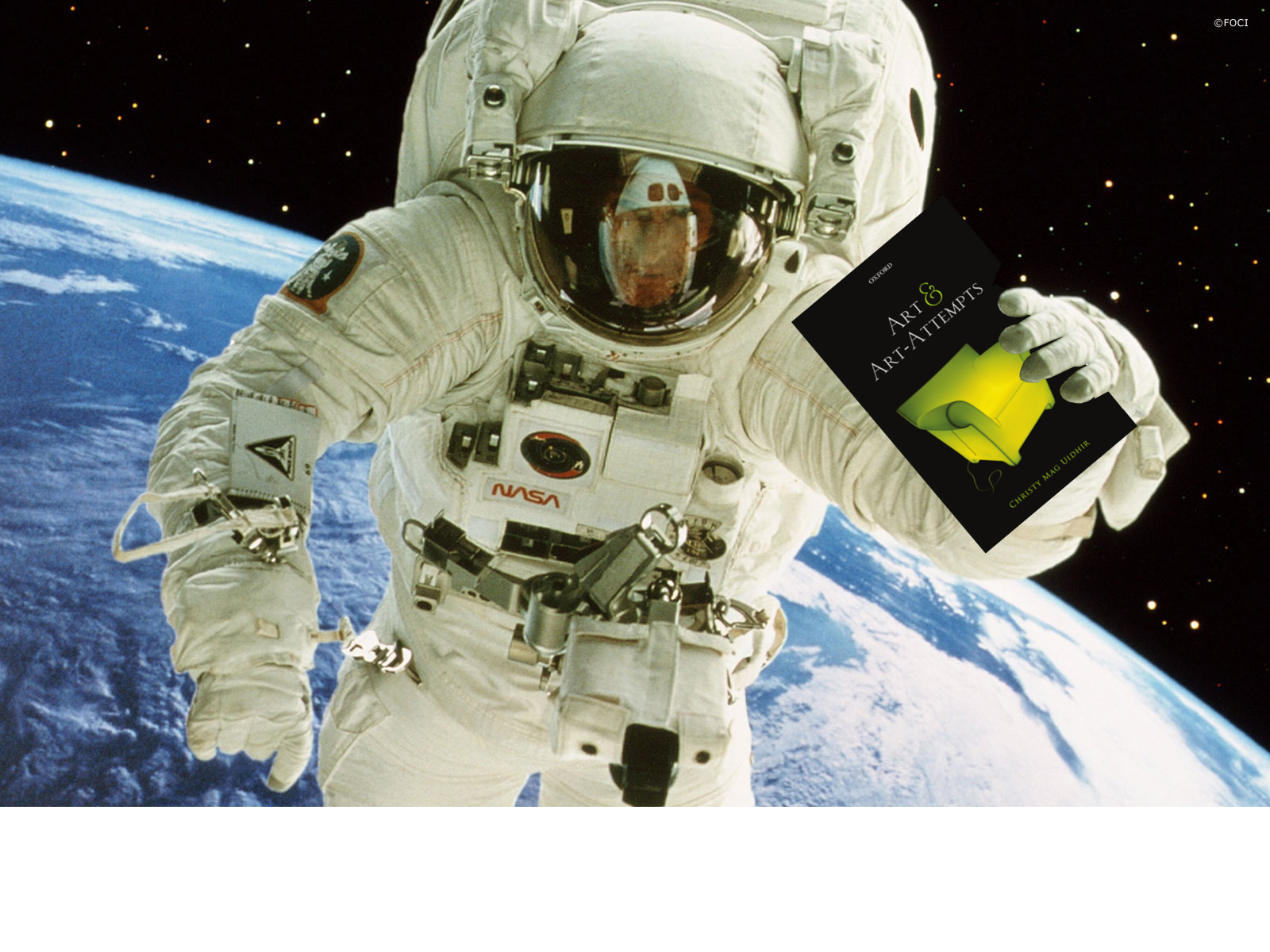 Astronaut holding copy of "Art and Art Attempts"