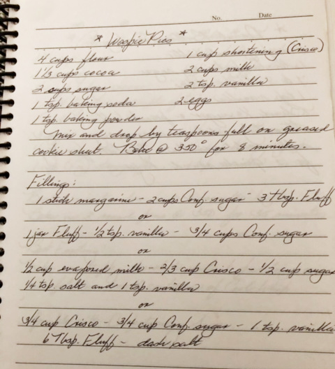 A photograph of a whoopie pie recipe written on a slightly aged notebook page. The title "Whoopie Pies" is written in the first line, with a star drawn on each side. The following lines detail the ingredients and method.