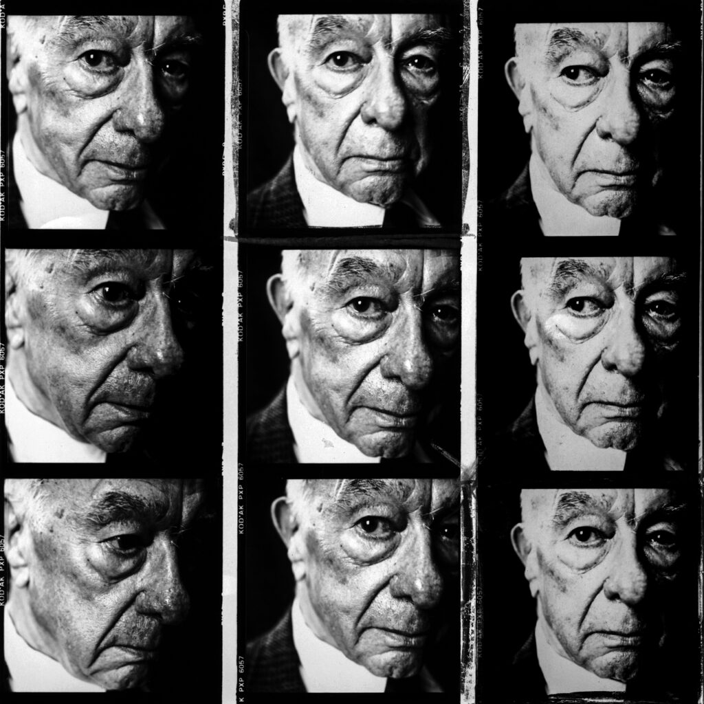 A contact sheet of 9 high contrast black and white portraits of W. V. Quine's, taken by Steve Pyke. All of the photographs are close-ups of Quine's face, while head position and gaze shifts between shots.
